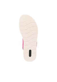 Rosa Schuhsohle mit strukturiertem Muster, geschwungenen Rillen und einem schwarzen Logo. Das Material ist Gummi mit einer weißen, gemusterten Außensohle für Traktion.