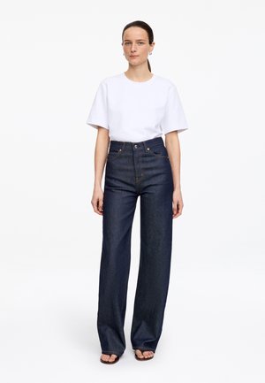 ARKET ARKET LUPINE FLARED JEANS - Jean flare - rinsed denim