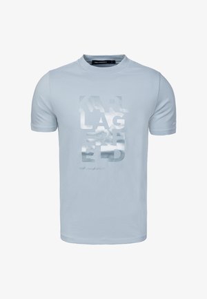 Light blue short-sleeve T-shirt with shiny silver block letters spelling "KARL LAGERFELD" on the front center.