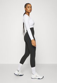 Björn Borg STUDIO SEAMLESS LIGHT - Trikoot - black beauty