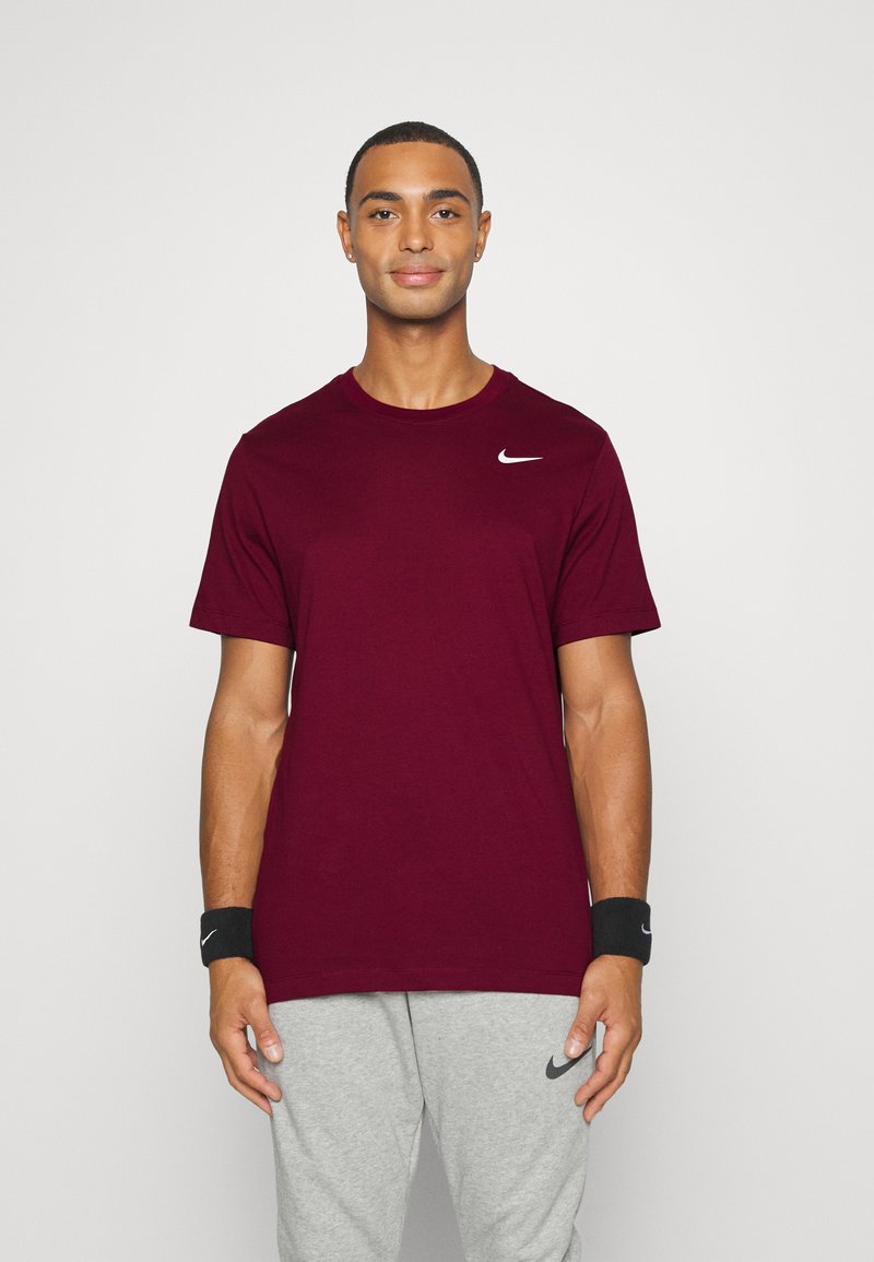 Nike Performance CREW SOLID - T-shirt desportiva - dark beetroot/white