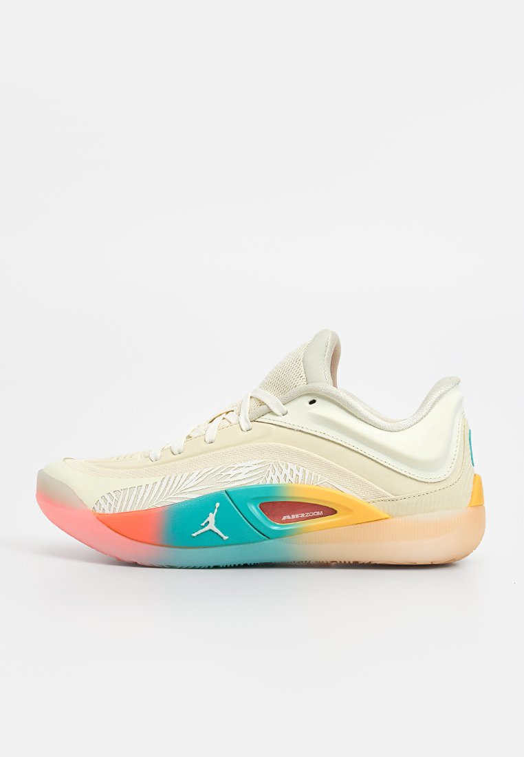Zapatilla deportiva beige con parte superior texturizada, acentos en color teal y naranja, y suela con patrón. Cuenta con un collar acolchado y diseño de cordones.