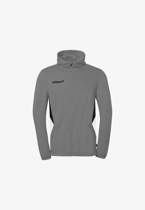 Grijze capuchonjas met volledige ritssluiting, zwart-witte zijpanelen, elastische manchetten, zakken aan de voorkant en het "uhlsport"-logo op de linkerborst.