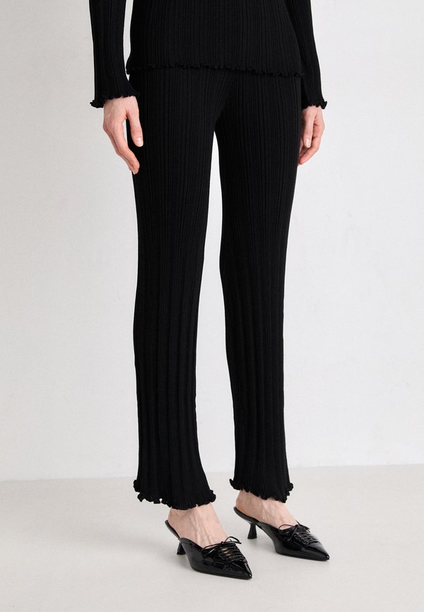 KNITTED BABYLOCK TROUSERS - Trousers