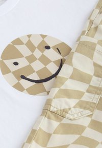 Next SET - Top s dlhým rukávom - neutral checkerboard