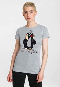 Gray cotton t-shirt featuring a cartoon mole with a red nose, black body, and gray belly, standing on a pile of rocks. Fitted design.