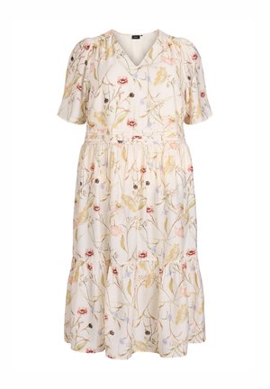 Ziedu kleita no viegla auduma, ar V-veida kaklu, īsām piedurknēm, jostu viduklī un slāņotu svārku ar dažādām ziedu manierēm maigos toņos.