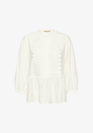 Vit bomullskblus med texturerad framdel och scallopdetaljer, rund halsringning och långa, rynkade ärmar.