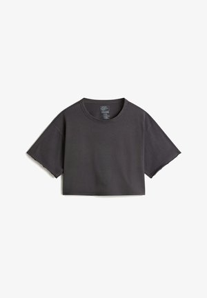 Zwarte cropped t-shirt van katoen, met korte mouwen, een ronde halslijn en ruwe randen voor een ontspannen uitstraling.