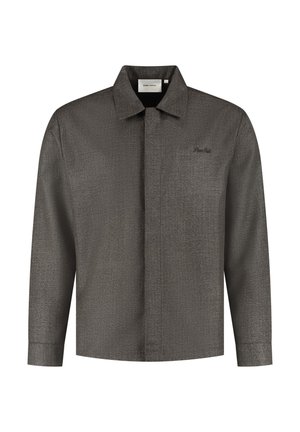 Langärmliges Hemd mit Knöpfen aus dunkelgrauem strukturiertem Stoff, mit einem Kragen und einem kleinen gestickten Logo auf der linken Brust.