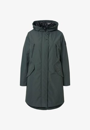 Tummanvihreä parka-takki, jossa on huppu. Takissa on kaksi vetoketjullista rintataskua, sivutaskuja läppäkuvalla ja sileä sisävuori. Pitkä ja suora leikkaus.