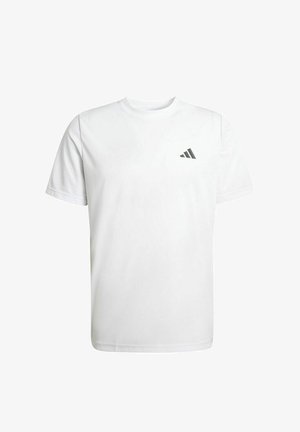 T-shirt bianca a maniche corte con scollo rotondo e un piccolo logo Adidas nero sul petto sinistro su uno sfondo bianco uniforme.