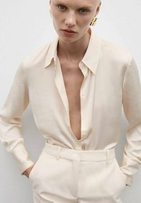 Mango Bluza z gumbi - off-white