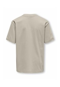 Beige kortærmet t-shirt med rund hals. Blød, glat tekstur. Lige kant forneden uden synlige mærker eller logoer på bagsiden.