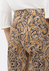 BRAX Kalhoty - beige