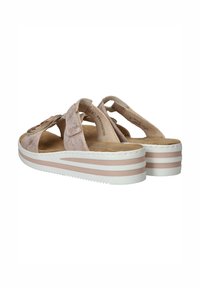 Pink suede sandals with three adjustable straps, cushioned footbed, and a white platform sole featuring two pink stripes.