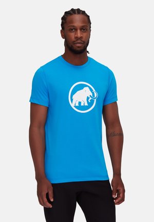 Blue cotton t-shirt featuring a large white elephant graphic within a circle. Classic crew neck and short sleeves with a smooth texture.
