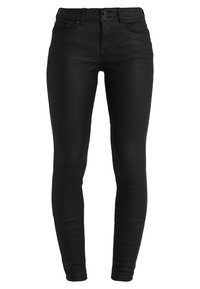 Černé skinny džíny vyrobené z elastického denimu. Mají vysoký pas, dvě přední kapsy a těsný střih.