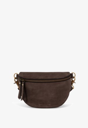 Brown suede crossbody bag with a curved shape, featuring a gold zipper, two side tassels, and embossed brand name on the front.