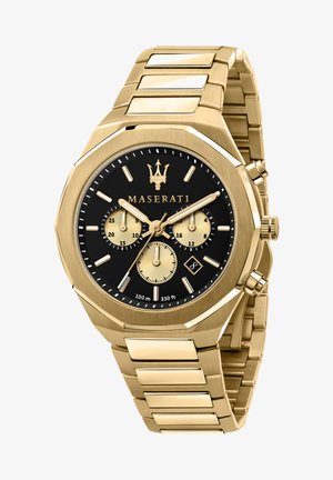 Guld rustfrit stål ur med oktagonal urkasse, sort skive, tre guld undercifre og datovisning; ledarmbånd med polerede detaljer.