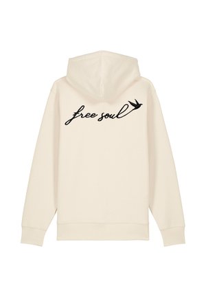 Hoodie couleur crème arborant une phrase brodée en noir "free soul" et un petit design d'oiseau noir au dos. Texture lisse, coupe régulière.