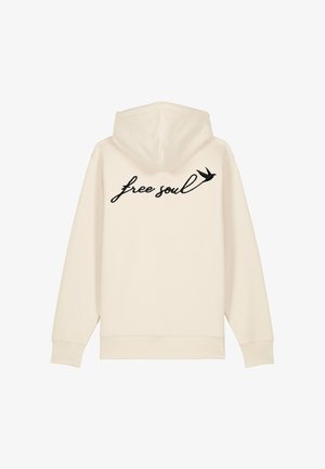 Felpa color crema con frase nera ricamata "free soul" e un piccolo design di un uccellino nero sulla schiena. Tessuto liscio, vestibilità regolare.