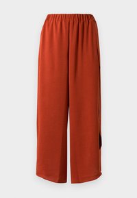 Wide-leg pants in a rust color, featuring an elastic waist, lightweight fabric, no visible pockets, and a smooth texture.
