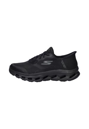 Black athletic shoe with a mesh upper, rounded toe, and cushioned sole. Features lace-up design and textured accents on sides.