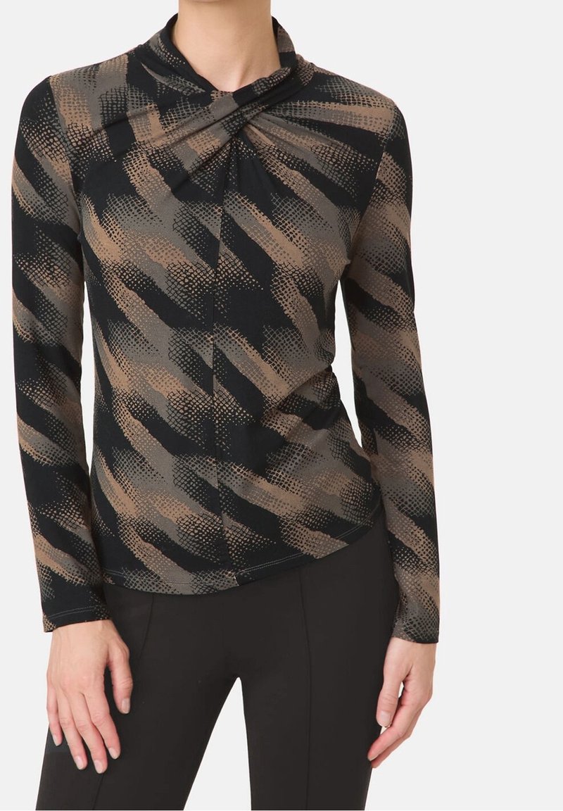 Zwarte longsleeve top met abstracte beige patronen, uitgerust met een gedrapeerde halslijn en een getailleerde pasvorm, gemaakt van zachte elastische stof.