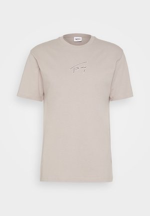 Beige cotton t-shirt with a round neckline and short sleeves. Features a white embroidered logo on the chest. Smooth texture.