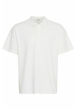 Wit poloshirt gemaakt van katoen, met korte mouwen, een kraag en een losse pasvorm. Geen zichtbare patronen of hardwaredetails.