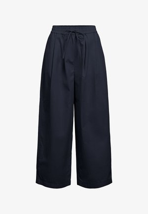 Mørkeblå bukser med vide ben, elastisk taljebånd og bindebånd foran, lavet af letvægtsstof, velegnet til afslappet brug.