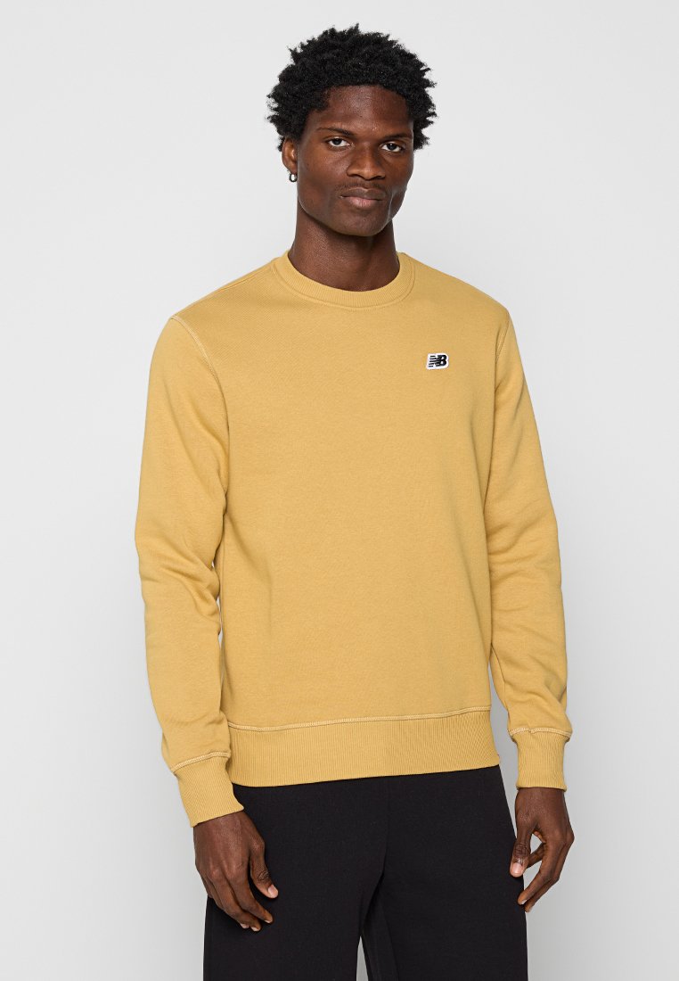 New Balance Sweater mosterdgeel New Balance Sweater mosterdgeel