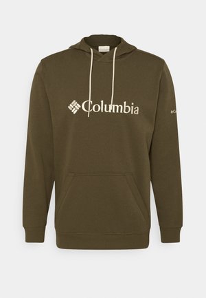 Felpa verde oliva con cappuccio e cordino, tasca frontale e logo Columbia bianco. Tessuto morbido, polsini e orlo a coste. Design di vestibilità standard.