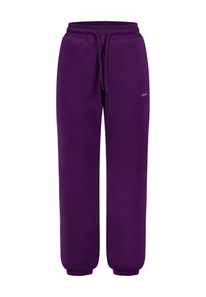 Pantaloni della tuta viola in un tessuto morbido, con vita elasticizzata e cordino, caviglie a coste e un accento di logo discreto.
