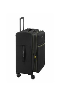 Valise noire avec des accents jaunes, en tissu durable, avec une poignée rétractable, des compartiments zippés et quatre roues pour la mobilité.