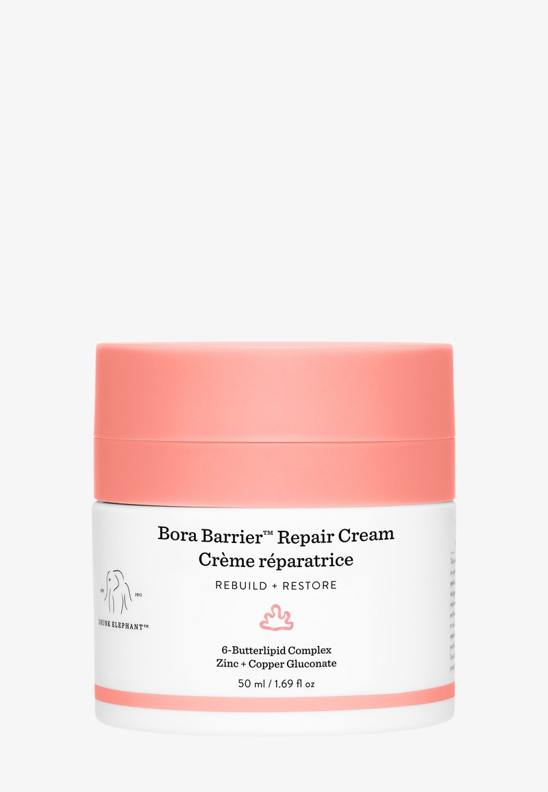 Bora Barrier Repair Cream in a cylindrical white jar with a pink lid. Contains 50 ml, labeled with product details and ingredients.