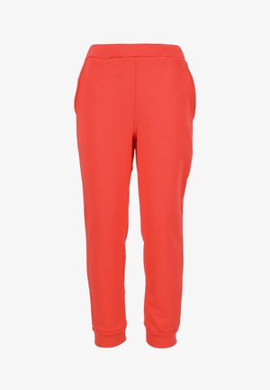 Røde sweatpants lavet af glat stof, med en afslappet pasform, elastisk talje, sidelommer og tilspidsede ankler.