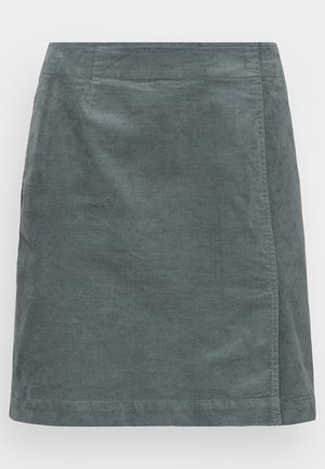 Donkergroene corduroy A-lijn rok met zichtbare stiksels en nette zoom, knielange lengte.