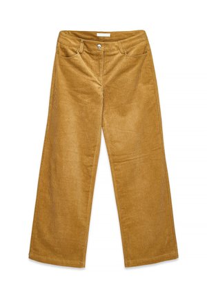 Vidbenede sennepsgule kordbukser med forlommer, bæltestropper og metal-knaplukning, lagt fladt på en hvid baggrund.