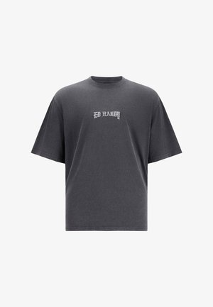 T-shirt oversized grigio scuro in cotone morbido, con logo bianco stampato "ED HARDY" centrato sul petto, maniche corte e colletto a girocollo.