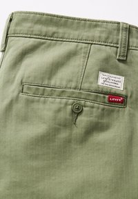Levi's® - Chinosy