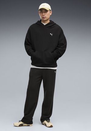 Puma, ESSENTIALS RELAXED JOGGINGHOSE - Jogginghose - black