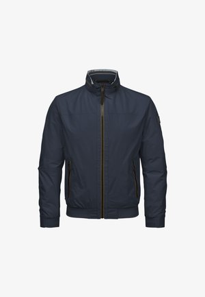Navy bomber jacket featuring a high collar, zippered front, and two side pockets with gold accents. Made from smooth, lightweight fabric.