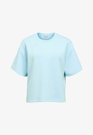 T-shirt bleu clair surdimensionné en tissu doux, avec manches courtes et col rond, sans motifs ni accents visibles.