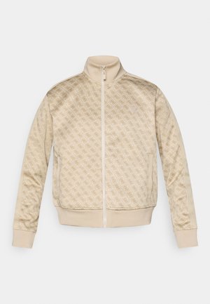 Beige zip-up jacket with a textured pattern, high collar, and ribbed cuffs. Features side pockets and a soft, smooth fabric finish.