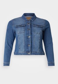 Blå denimjacka med långa ärmar, knäppning framtill, två bröstfickor och ljusare partier på axlarna. Har metallknappar och klassisk krage.