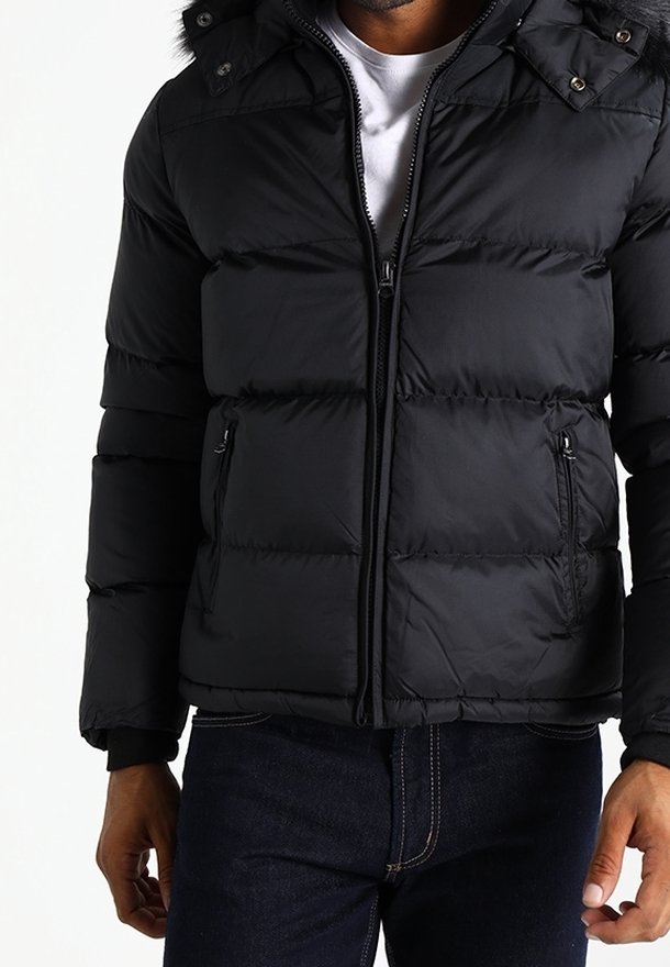 Black puffer jacket with a zip front, two side pockets, and a detachable hood. Features horizontal quilted design and snap buttons.