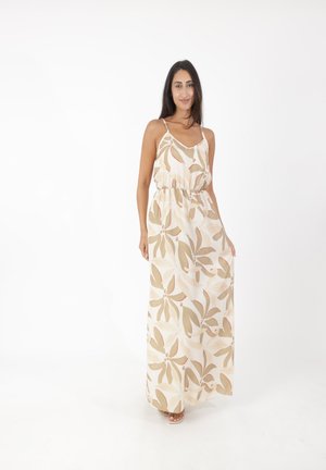 Robe maxi en tissu beige clair avec un motif de feuilles dans des verts atténués et des rose doux. Taille élastique avec fines bretelles. Modèle longueur de sol.