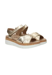 Gouden metallic sandalen met een kurken zool, met gekruiste banden en een witte platform. Gladde textuur en verstelbaar ontwerp voor comfort.